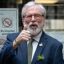 O ex-presidente do Sinn Fein, Gerry Adams, nega ter sido membro do IRA ao prestar depoimento no tribunal britânico pela primeira vez