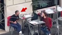 Shia LaBeouf grita com mulher sentada ao lado dele em restaurante, em vídeo
